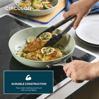 Someone cooks with a Ceramic Nonstick 2-Piece Skillet Set.