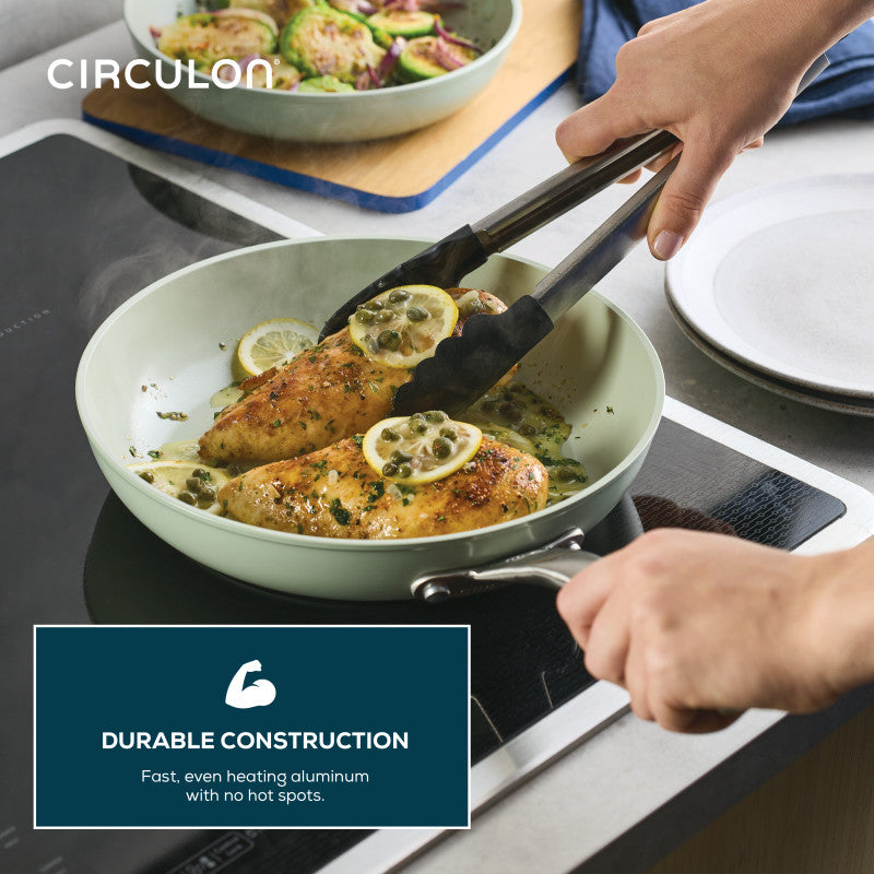 Someone cooks with a Ceramic Nonstick 2-Piece Skillet Set.