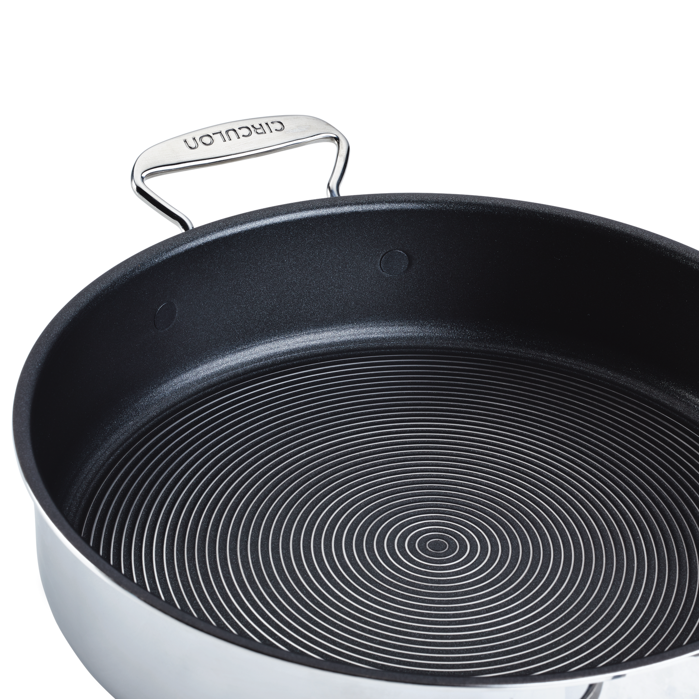 Non-stick frying pan with a circular pattern and a metal handle.