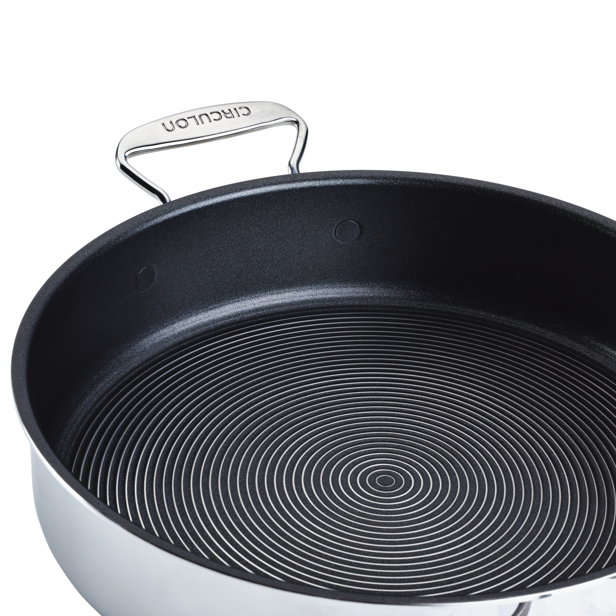 Non-stick frying pan with a circular pattern and a metal handle.