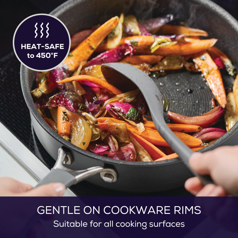 Vegetables sautéed in a pan with the 4-Piece Silicone Tools Set.