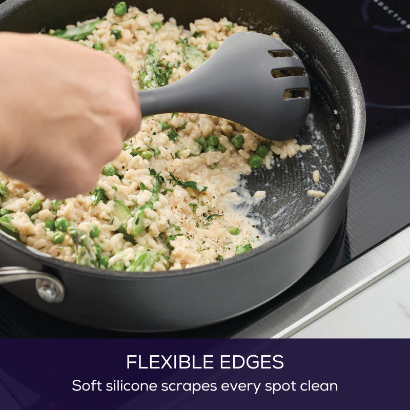 Stir rice and veggies with the 4-Piece Silicone Tools Set in a nonstick pan.