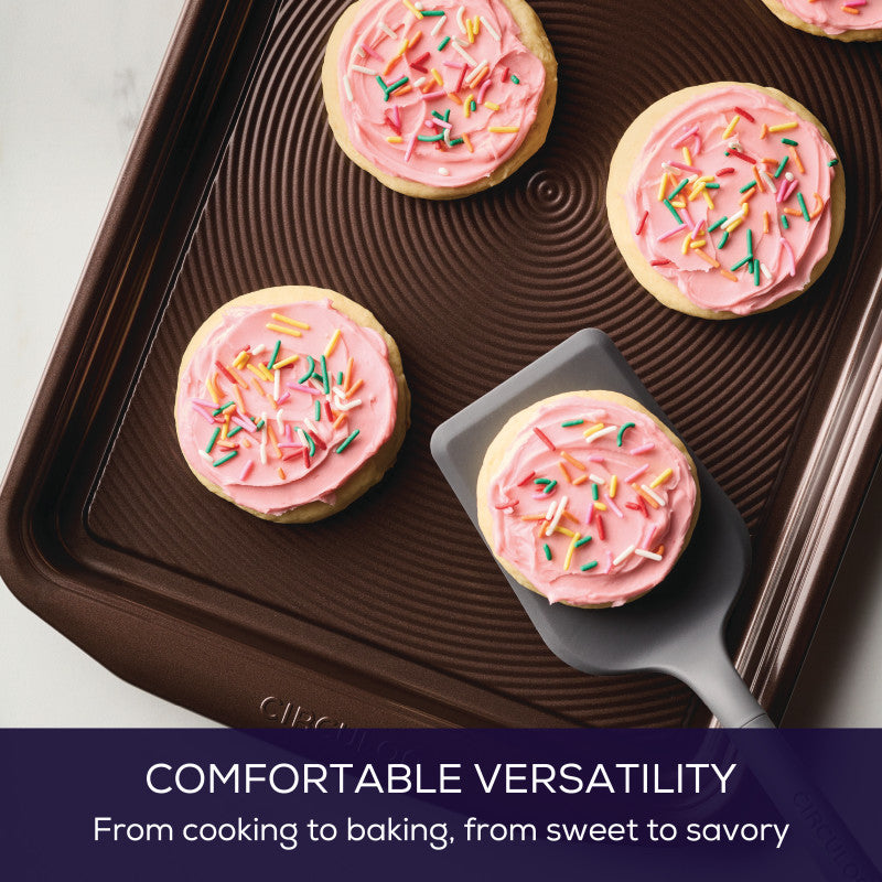 A 4-Piece Silicone Tools Set lifts a pink cookie; they're dishwasher safe.