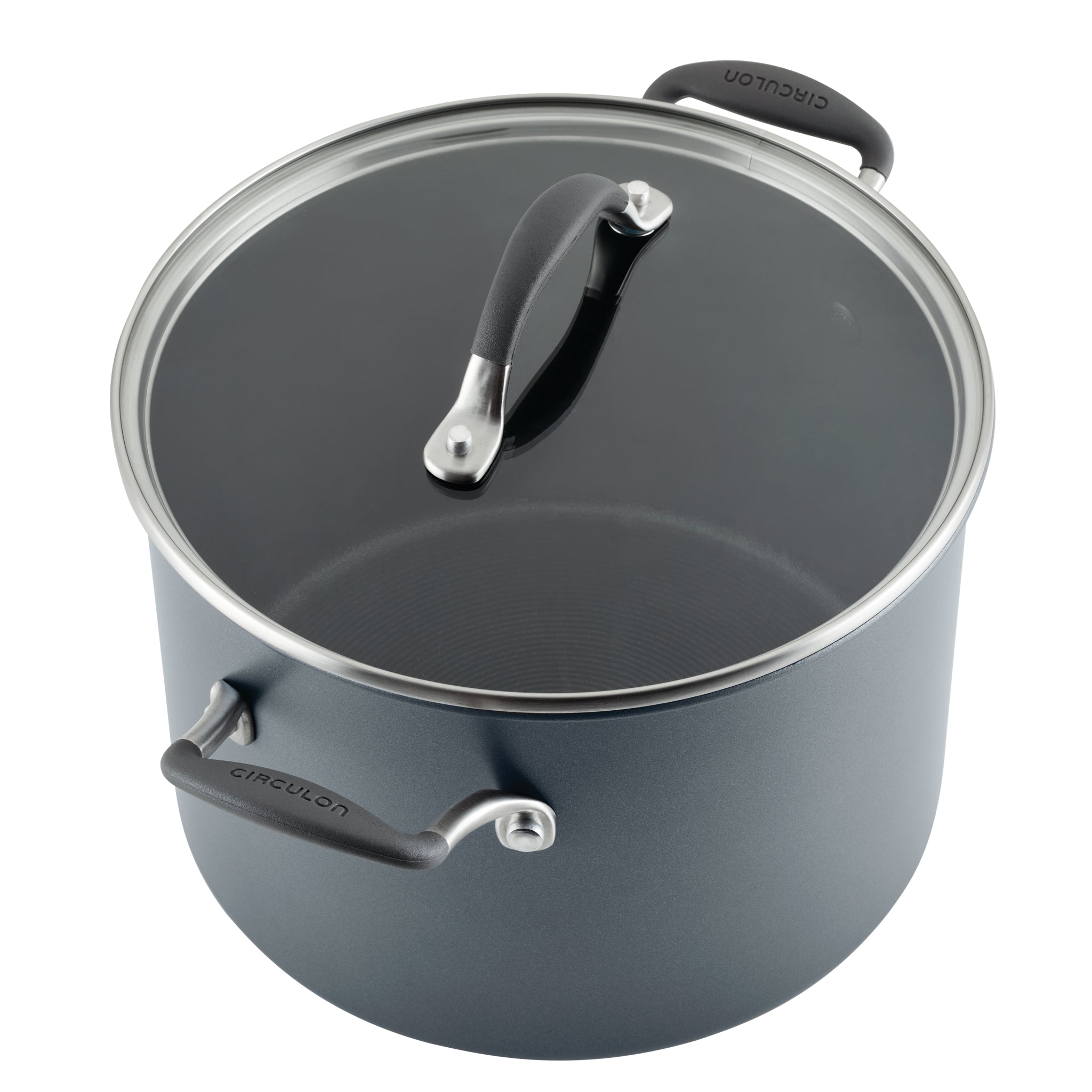 Gray cooking pot with a glass lid and black handles.