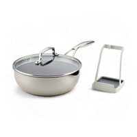 Infinity Pan with ScratchDefense™, glass lid, and utensil rest on white.