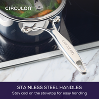 Pot with stainless steel handle on a stovetop, brand logo visible.