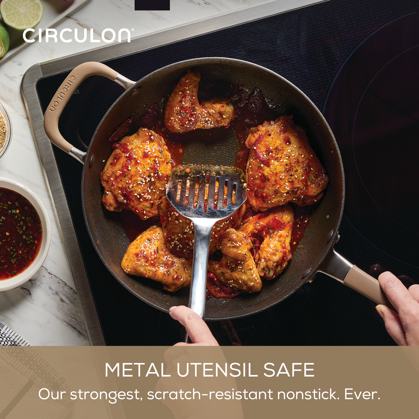 Cooking spicy chicken in ScratchDefense nonstick cookware set on the stovetop.