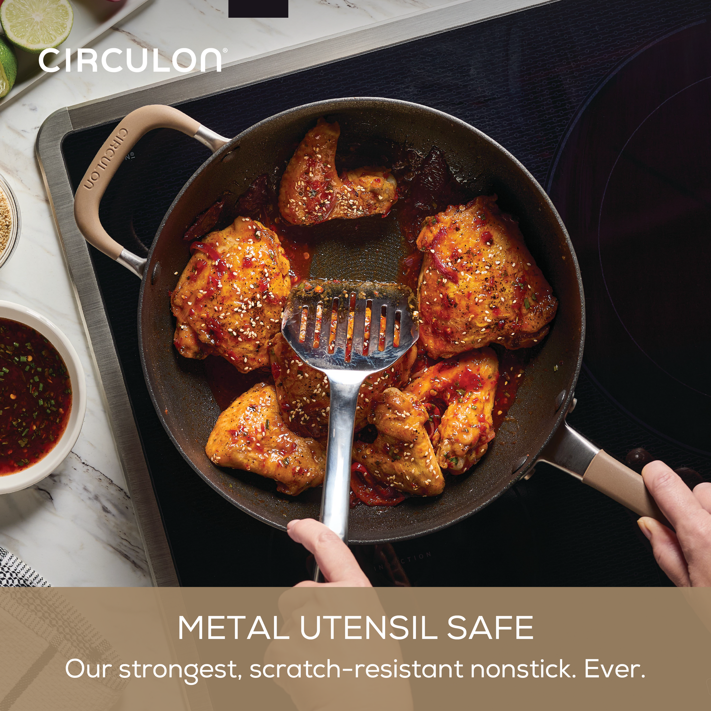 Cooking spicy chicken in ScratchDefense nonstick cookware set on the stovetop.