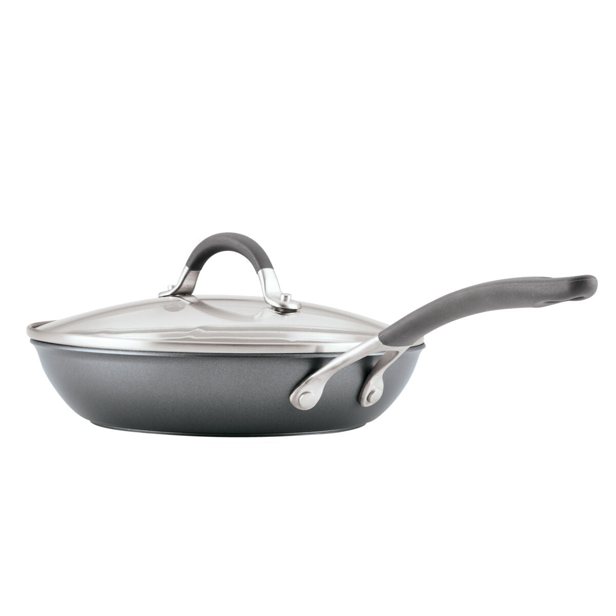 A nonstick frying pan with a glass lid and ergonomic handle.