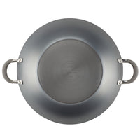 Bottom view of a non-stick frying pan with two handles.