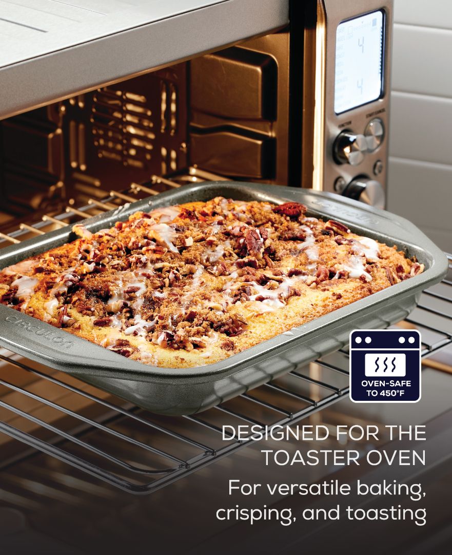 Pastry in toaster oven set with nonstick and temp icon.