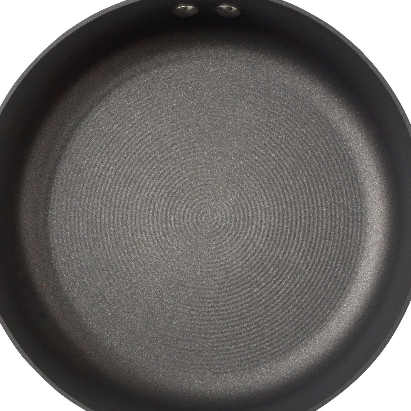 Empty non-stick frying pan with a circular pattern on the cooking surface.