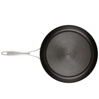 Nonstick pan with SteelShield ridges and metal handle, from a 10-piece set.