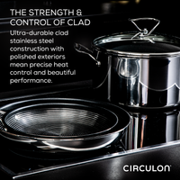 The 11-Piece Clad Stainless Steel and Hybrid Nonstick Cookware Set with Circulon branding sits on the stove, showcasing innovative SteelShield technology for enhanced durability.