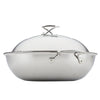 Wok equipped with Hybrid SteelShield Technology, a glass lid, and sturdy side handles.