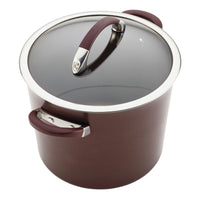 This brown cookware set from the 11-Piece Cookware Collection boasts a hard-anodized construction, glass lids, and sturdy metal handles, ensuring both durability and style.