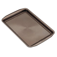 2-piece 10" x 15" nonstick cookie pan set with textured, raised-edge design.