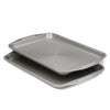 The Gray Nonstick Cookie Sheet Set features two stacked heavy gauge steel sheets with grooved surfaces that provide excellent warp resistance.