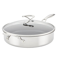 5 Quart Tri-Ply Clad Nonstick Saute featuring SteelShield technology, equipped with a glass lid and an additional helper handle for easy maneuvering.