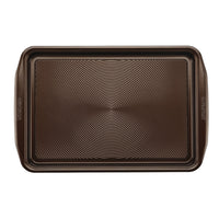 The Nonstick Cookie Pan, with its rectangular shape and spiral surface design, is perfect for evenly baking your treats and is fully oven safe.