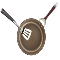 An item from the 11-Piece Cookware Set: Nonstick & Hard-Anodized includes a frying pan with hard-anodized construction and a slotted spatula resting on its nonstick surface.
