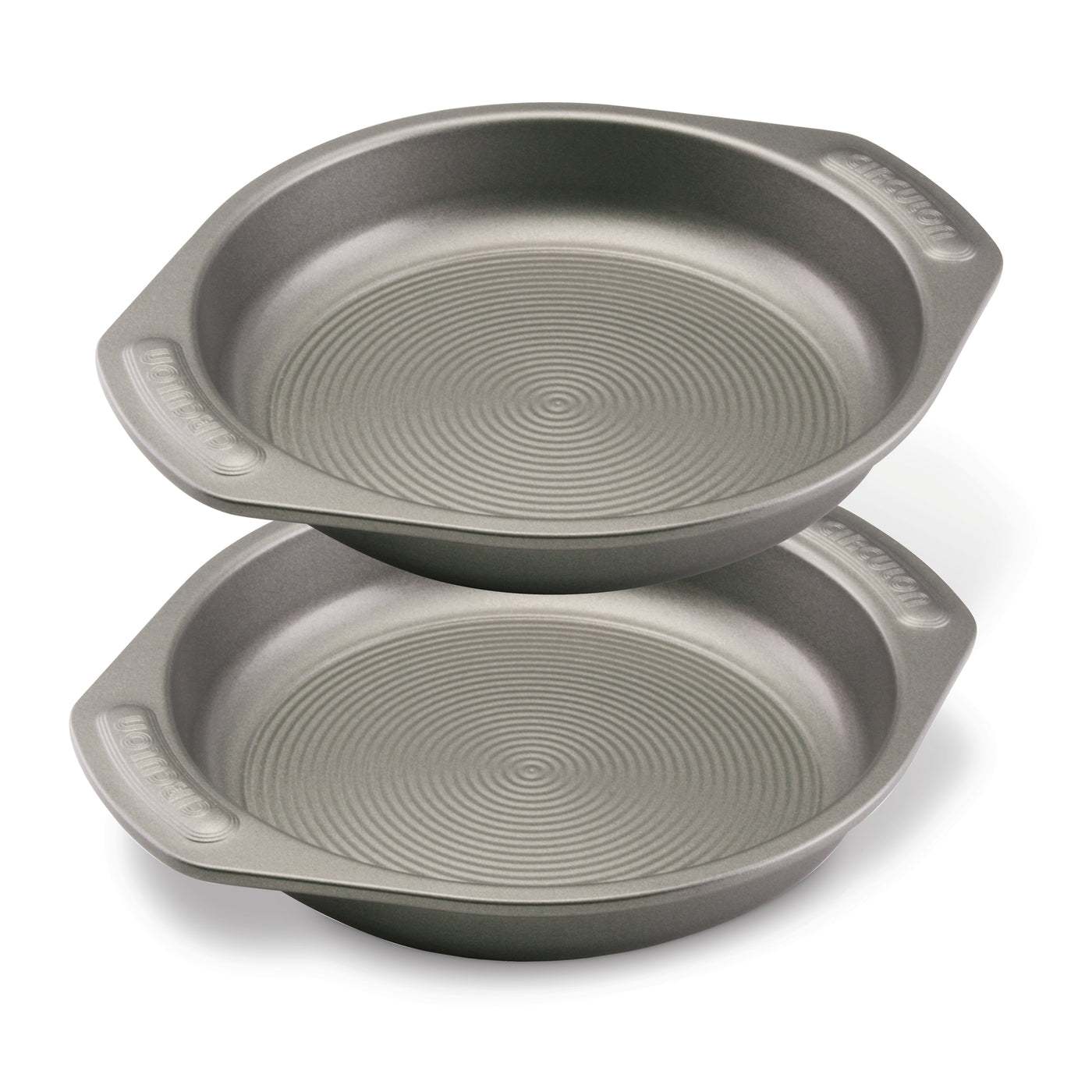 The 2-Piece 9-Inch Nonstick Cake Pan Set consists of two heavy gauge steel cake pans, each equipped with handles for easy maneuvering. The unique interiors of these baking pans guarantee flawless results every time.