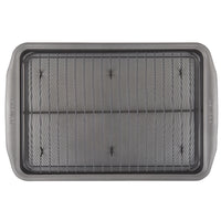 Top view of a nonstick heavy gauge steel baking pan with a wire rack, included in the 10-Piece Nonstick Bakeware Set, designed for easy cleanup.